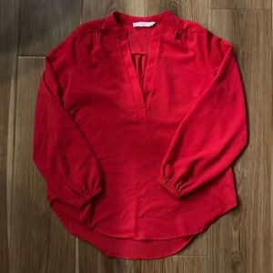 Lush top. Size XS. Pretty red!